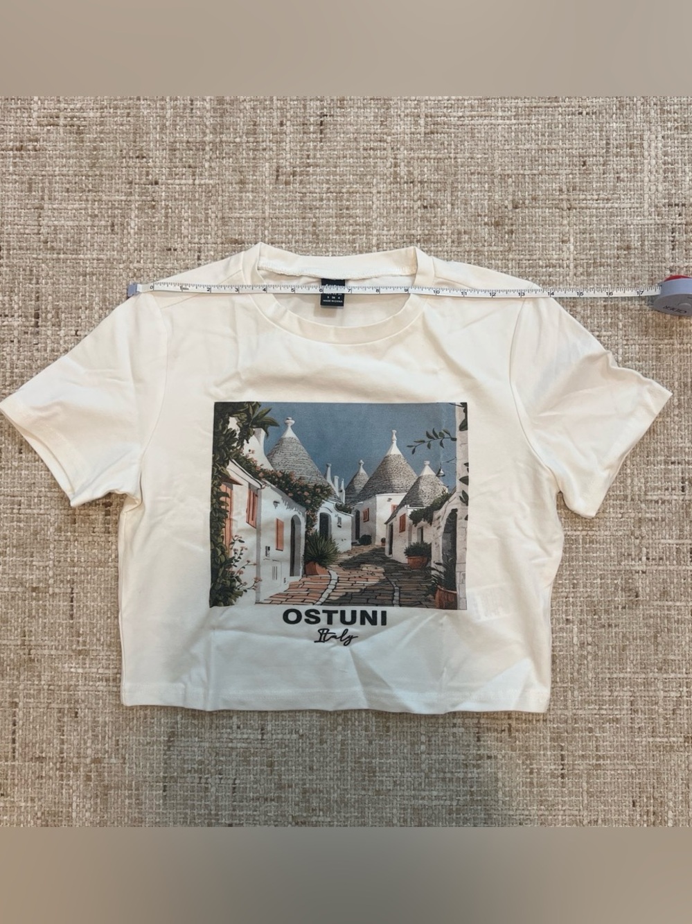 White cropped tee with Ostuni Italy graphic